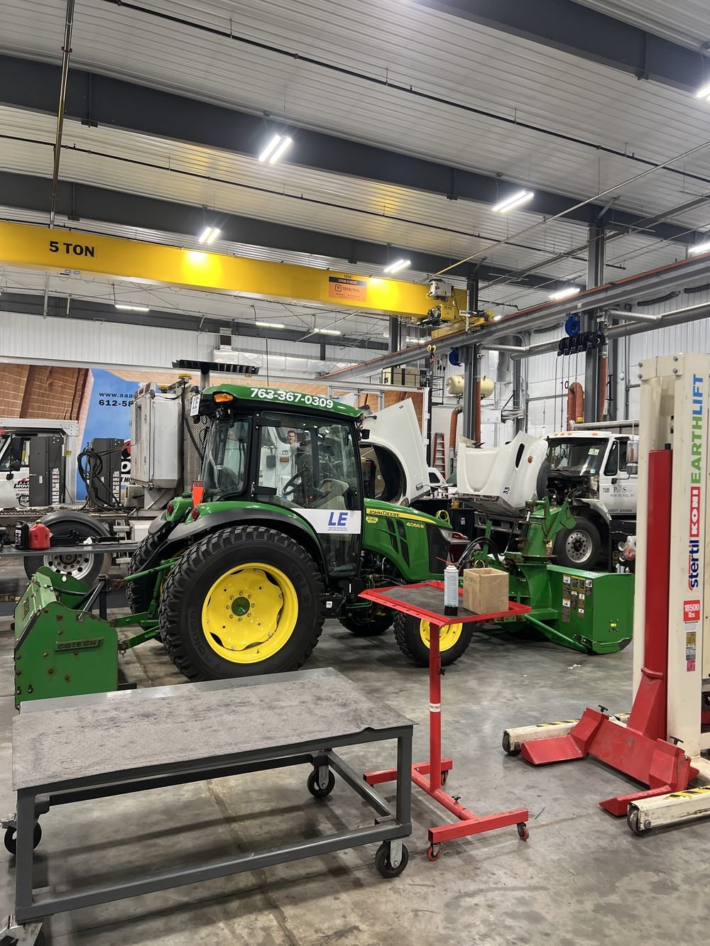 Lindquist Outdoor Services equipment being serviced
